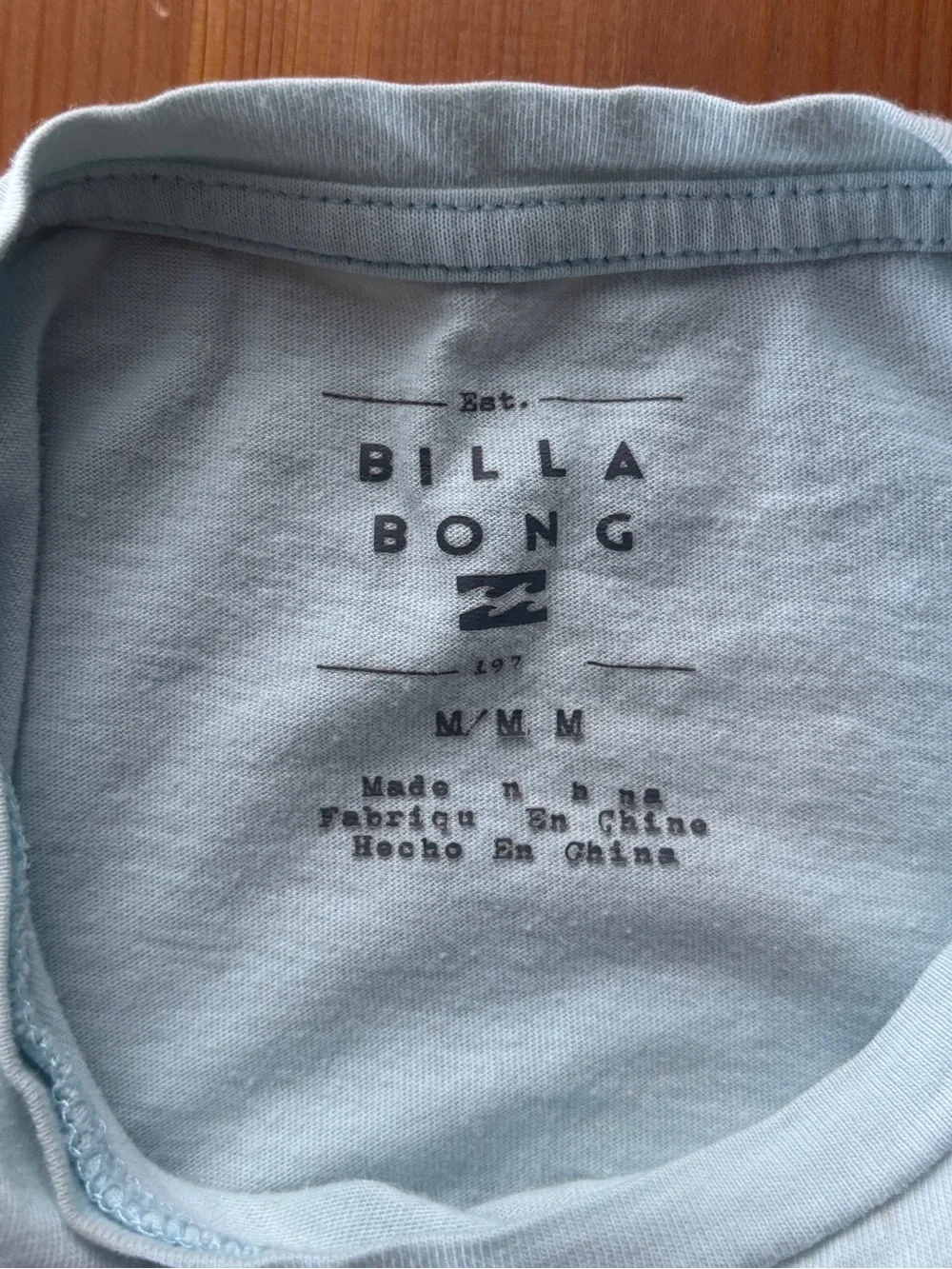 Girls Billabong Pastel Graphic Tee in Light Blue with Pink Sun & Orange Waves